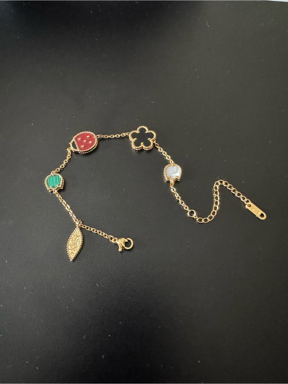 Gold Multi-Charm Bracelet with Red, Green and White Accents